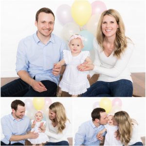 Parents and one year old daughter pose with balloons by Raindancer Studios Indianapolis Children Photographer Jill Howell