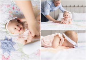 Father plays with one year old baby girl on bed by Raindancer Studios Indianapolis Children Photographer