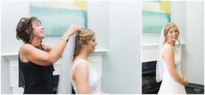 Mother of the groom putting brides veil on her by Raindancer Studios Indianapolis Wedding Photographer Jill Howell