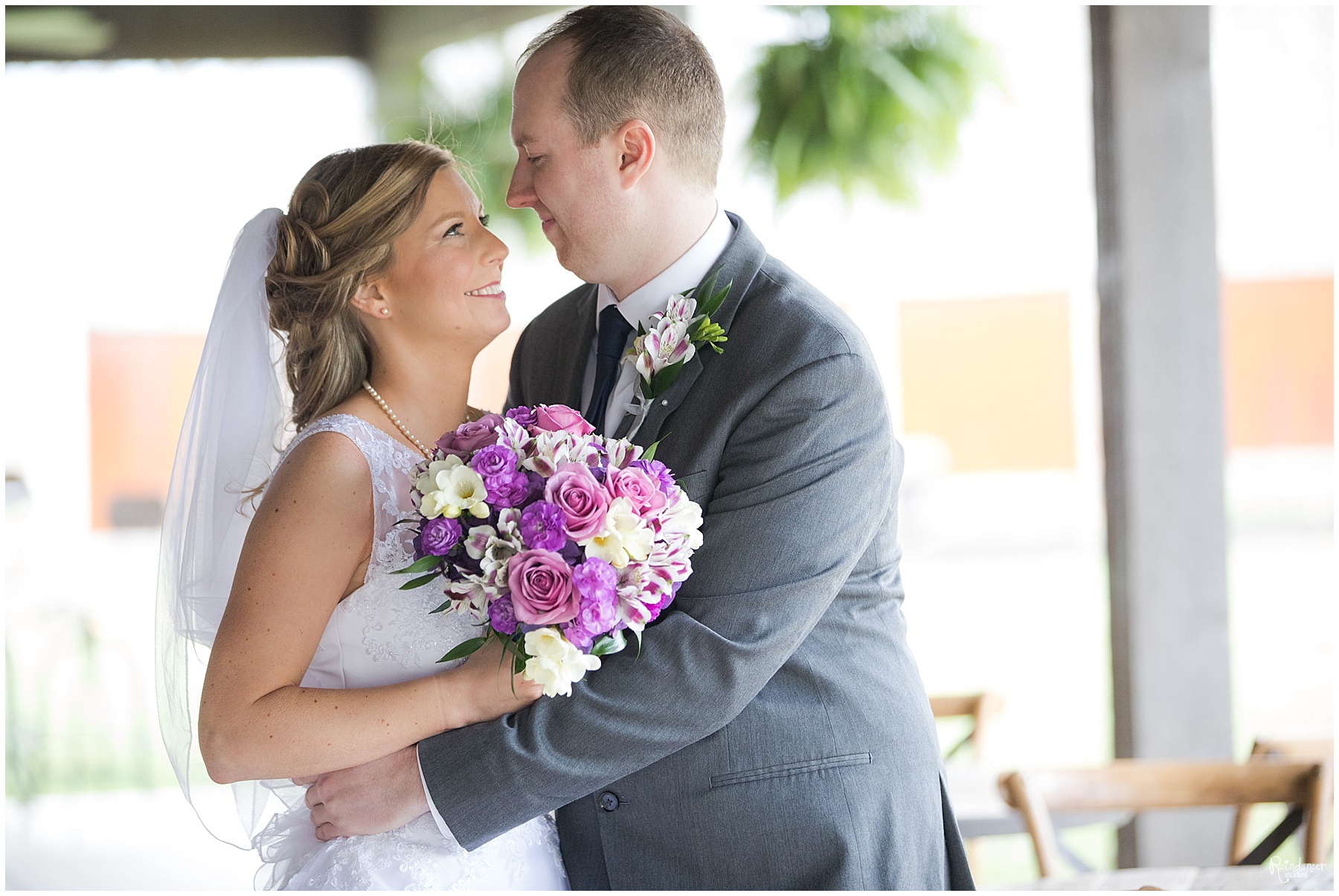 Bride and groom hugging by Raindancer Studios Indianapolis Wedding Photographer Jill Howell