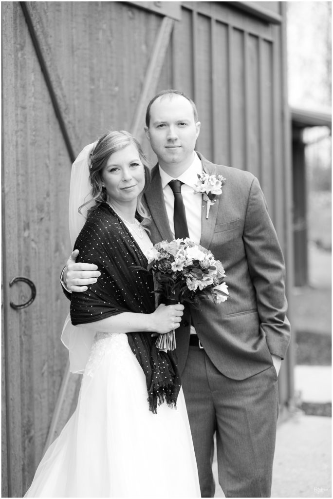 Bride and groom posing outside by Raindancer Studios Indianapolis Wedding Photographer Jill Howell