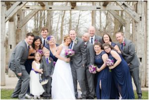 Bride, groom, and wedding party posing by Raindancer Studios Indianapolis Wedding Photographer Jill Howell