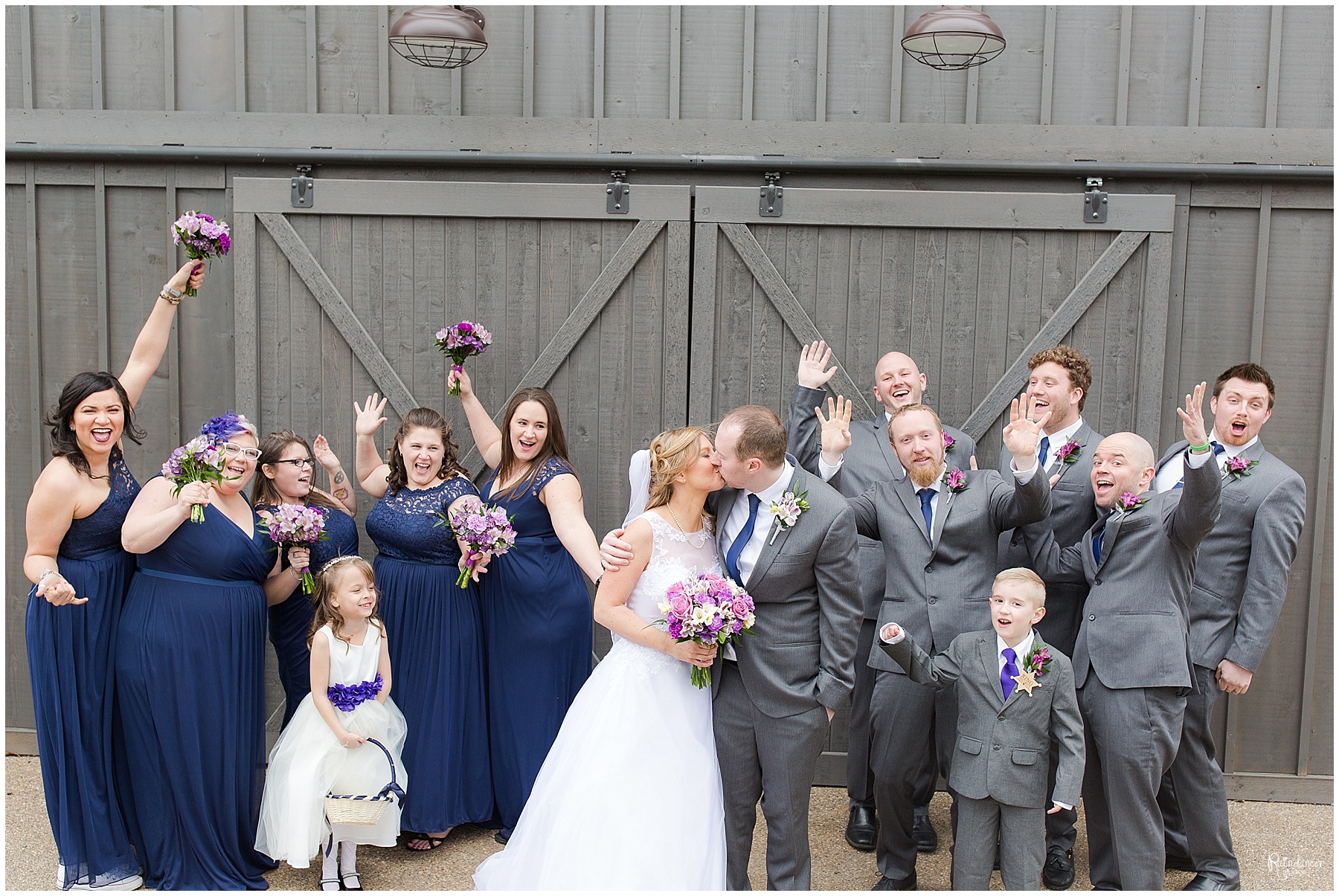 Bride, groom, and wedding party posing by Raindancer Studios Indianapolis Wedding Photographer Jill Howell