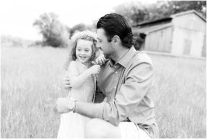 Father and her little girl hugging in a field, Indianapolis Family Photographer