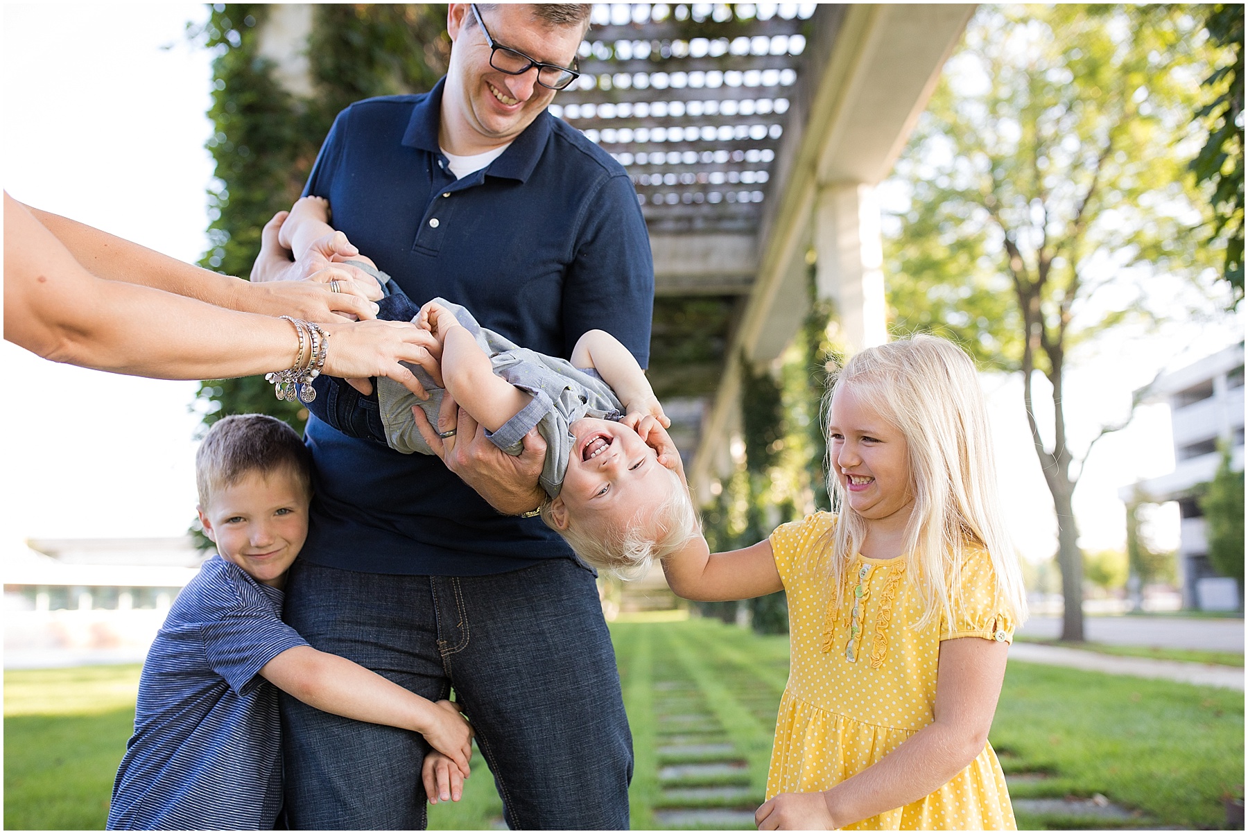 Father being silly and tickling his three children, Columbus Family Photographer, Raindancer Studios