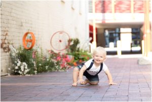 One year old boy crawling in alley way, Columbus Family Photography, Raindancer Studios