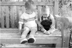 Brother and sister sitting on a outdoor bench, Indianapolis Family Photography, Raindancer Studios