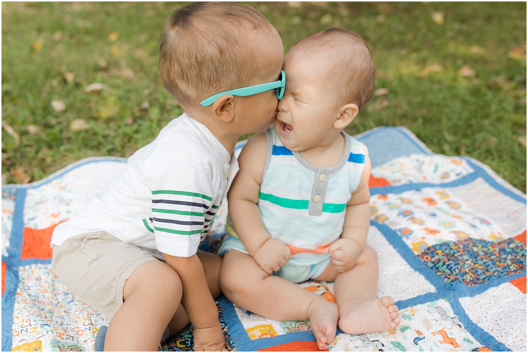 Brotherly love, kissing sister.  Indianapolis Family Photography, Raindancer Studios