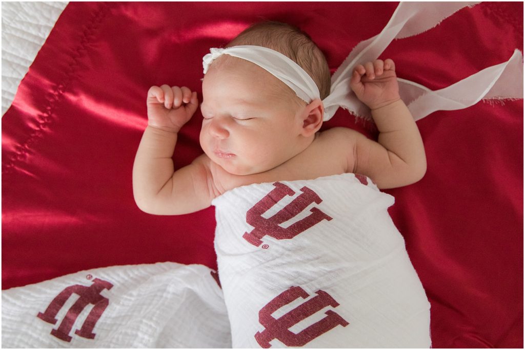 Baby girl wrapped in IU blanket. Indianapolis Newborn Photography